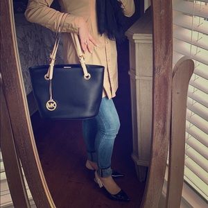 MK black purse with cream straps